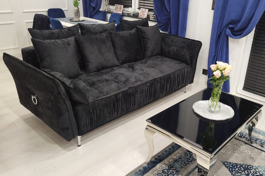 czarna sofa Plissia w welurowej tkaninie z ozdobnymi marszczeniami we wnętrzu